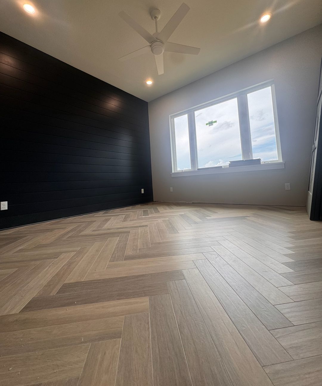 The same bedroom when done, with a herringbone floor.